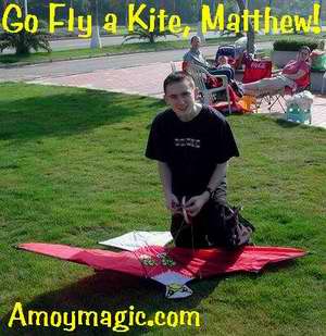 Matthew prepares to fly a kite on the island ring road